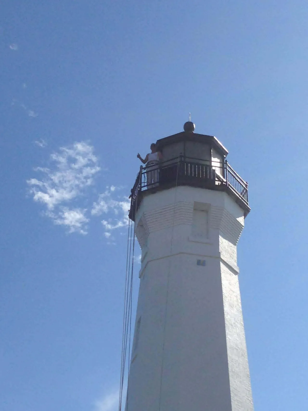 Detail of Skillagalee's lantern room and gallery at the top of the white tower.